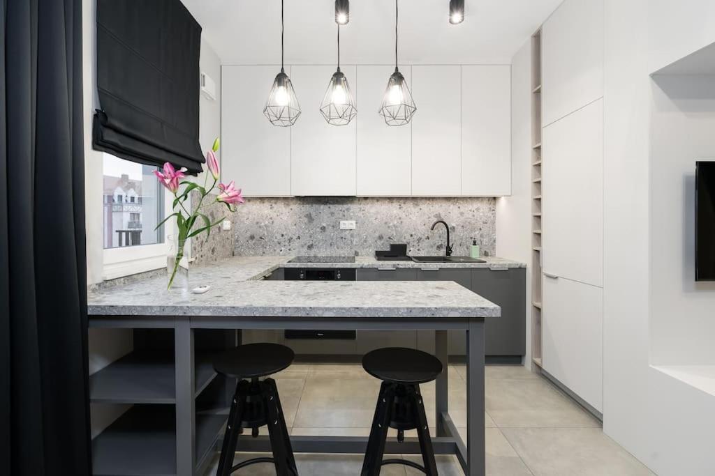 Апартаменты Nowoczesne Studio Przy Warcie Познань Экстерьер фото